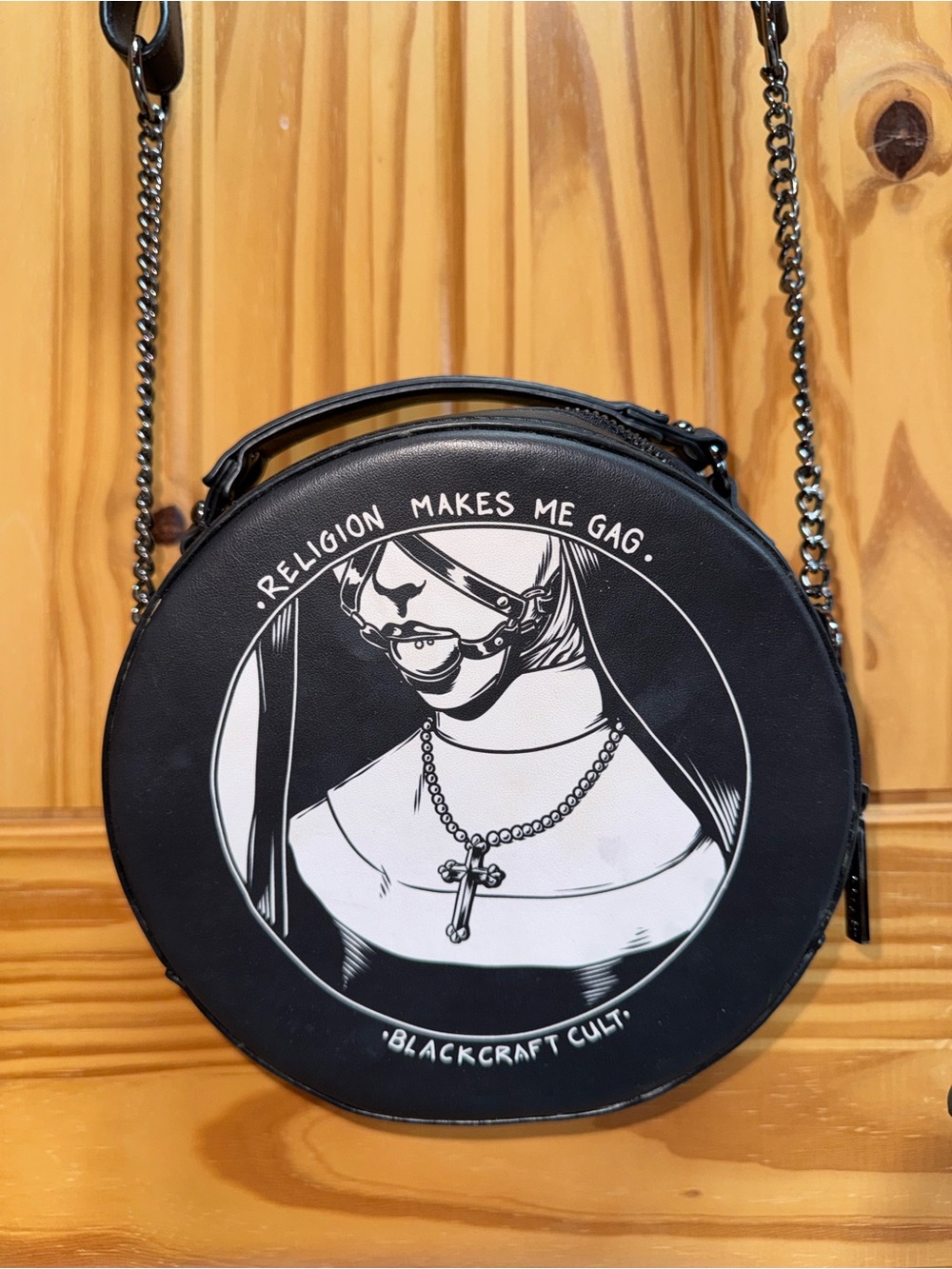 Blackcraft Cult Round Crossbody Bag with Graphic Nun Print
